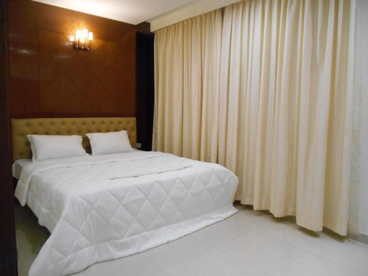 Hotel The Grand Coral à Bangalore Extérieur photo